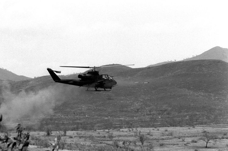 Image: AH-1 Cobra firing 2.75 inch rockets