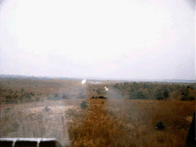 Image: Pilot's eye view of 2.75 inch rockets going downrange