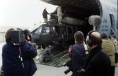 Image: Airmen unload an Army Blackhawk helicopter from a C-5 Galaxy 