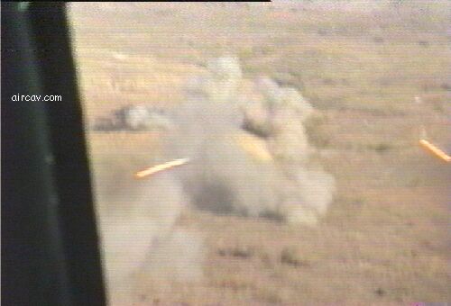 Image: Cockpit view of 2.75 inch rockets being fired