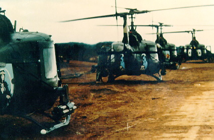 Image: Four Sharks at Khe Sanh - UH-1 Huey gunship helicopter